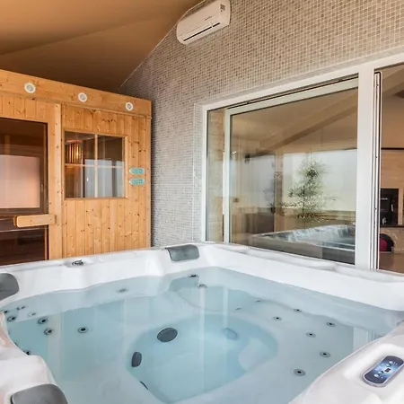 Superb Maxima With Private Pool, Sauna, Jacuzzi, Playground For Up To 18 Persons, Extra Pool Heating Available