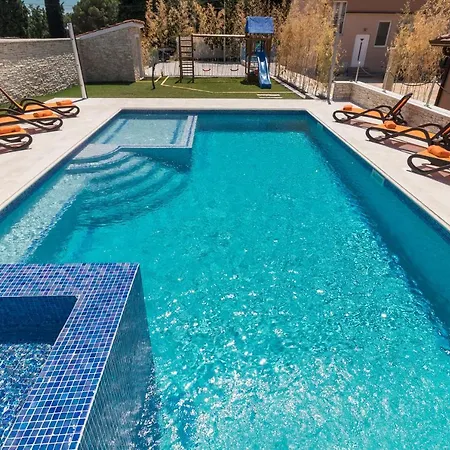 Superb Maxima With Private Pool, Sauna, Jacuzzi, Playground For Up To 18 Persons, Extra Pool Heating Available Villa