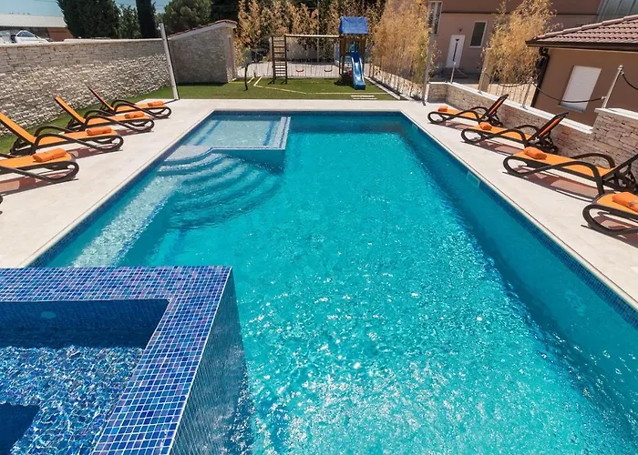 Superb Maxima With Private Pool, Sauna, Jacuzzi, Playground For Up To 18 Persons, Extra Pool Heating Available Villa